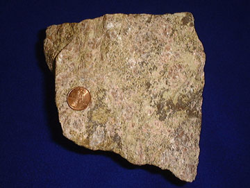rare earth ore with penny